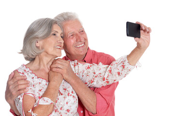 Canvas Print - senior couple taking selfie isolated on white background, full length