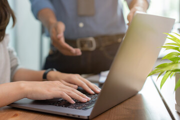 close up young trainee programmer woman hand type on laptop to check about code or bugs on program w