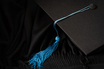 Black Graduation Cap university pace on graduation gown graduation concept