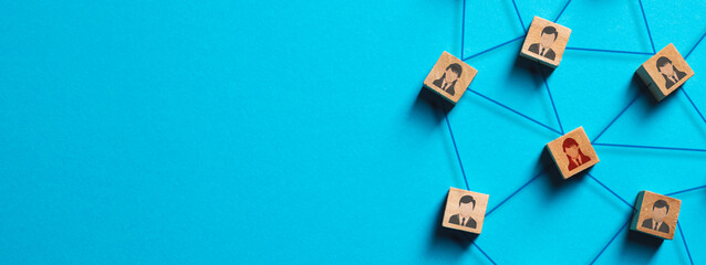 Organization structure, social network and teamwork concept on blue background. Business people icon on wooden cube blocks connecting network of connections