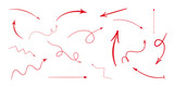Fototapeta  - Ręcznie rysowane strzałki w czerwonym kolorze. Zestaw wektorowych strzałek wskazujących różne kierunki: dół, prawo, lewo, góra. Strzałki proste, krzywe, łamane, zakręcone.