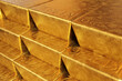 Stacks of gold bars imprinted with unique serial numbers. Illustration of the concept of wealth and gold reserves by central banks