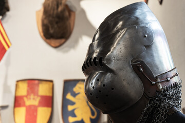 Medieval knight armor, closed iron helmet close up