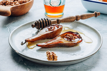 Wall Mural - Sweet baked pears with honey and walnuts. Healthy autumn recipe.