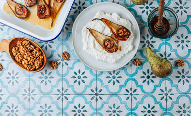 Wall Mural - Sweet baked pears with honey and walnuts. Healthy autumn recipe.