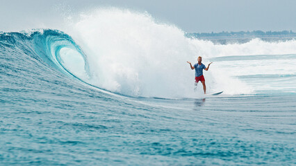 Poster - Surfer rides the wave during day