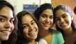 © Get Stock - Group of Diverse and Empowered Hispanic Youth Female High School Students Working Together in Language Club : Power of Collaboration in Clubs, Sports Teams (generative AI)