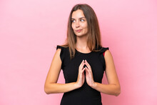 Young Caucasian Woman Isolated On Pink Background Scheming Something