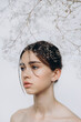 © Ananass - stylish portrait of a young 15-year-old model girl with natural light in a spacious photo studio