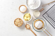 © thanksforbuying - Baking ingredients and cooking utensil on marble kitchen table background