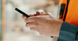 © D Lahoud/peopleimages.com - Social media, internet and hands of an architect with a phone for communication, construction website and building app. Construction worker working on a mobile, typing on web and doing search on site