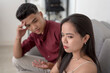 © Mdv Edwards - A young moody woman ignores her boyfriend explanations, not believing his reasons. A hurt wife distrusting her husband.