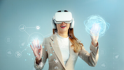 Poster - Metaverse technology concept. Businesswoman with VR virtual reality goggles touching AI and Digital icon on virtual screen. Futuristic lifestyle light background
