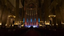 Interior Of Majestic Cathedral Of Barcelona With Glowing Lights For Concert, Dolly Forward