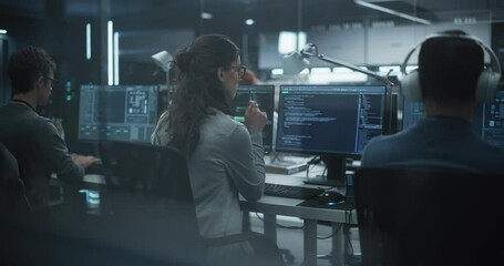 Group of Multicultural Men and Women Working in a Research Center, Collaborating and Discussing a Project, Using Computers to Write Advanced Software Code, Develop Artificial Intelligence Service