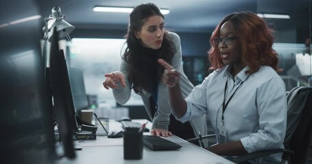 Aufkleber - Two Diverse Colleagues Having a Conversation While Busy Working on a Team Project. African Female Designer Talking with a Project Manager. Teamwork in Technology Laboratory