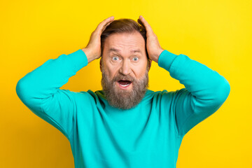 Wall Mural - Photo of stressed depressed man wear trendy clothes shocked negative information accident isolated on yellow color background