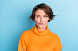 © deagreez - Photo portrait of attractive young woman look skeptical empty space eyebrow dressed stylish orange outfit isolated on blue color background