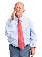 Canvas Print - Senior handsome grey-haired man wearing elegant tie and shirt touching mouth with hand with painful expression because of toothache or dental illness on teeth. dentist