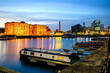 Royal Albert dock illuminated at night in Liverpool UK