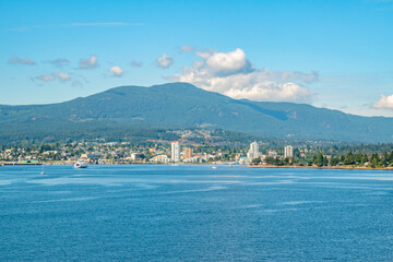 Wall Mural - Nanaimo Bay and the City of Nanaimo on a summer day on Vancouver Island, British Columbia, Canada