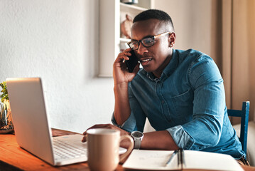 Aufkleber - Hello, can I help you. Cropped shot of a handsome young businessman sitting alone in his home office and talking on his cellphone.