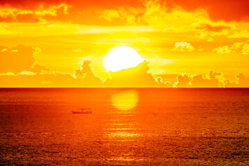 Wall Mural - 	
adventure on lonely boat with cloudy sky and beautiful sunset in the background, puerto vallarta jalisco	