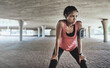 © D Donson/peopleimages.com - Youve gotta sweat for it. Shot of a sporty young woman taking a break while exercising outdoors.