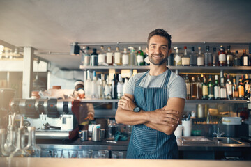 Poster - Theres a reason my customers keep coming back. Portrait of a young man working behind a bar counter.
