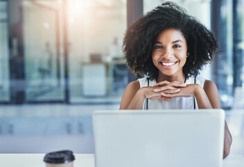 Canvas Print - Taking the time to reflect on the business. Cropped shot of an attractive young businesswoman in her office.