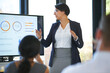© M Moller/peopleimages.com - Lets look at the numbers. Cropped shot of a businesswoman giving a presentation in the boardroom.