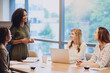 © Adene S/peopleimages.com - She has the floor. Cropped shot of an attractive young businesswoman addressing her colleagues during a meeting in the boardroom.