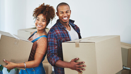 Fototapete - Only bringing positivity to their new home. Shot of an attractive young couple moving house.