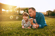 © Jadon Bester/peopleimages.com - Nothing grows a father son bond like fun. Cropped shot of a young family spending time together outdoors.