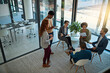 © M Moller/peopleimages.com - Strengthening partnerships through teamwork. Shot of a group of creatives having a meeting in a modern office.