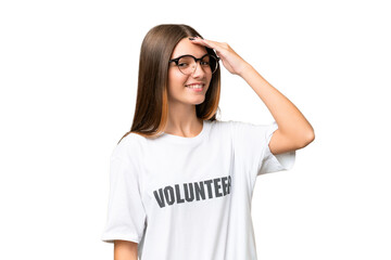 Poster - Teenager volunteer caucasian girl over isolated background smiling a lot