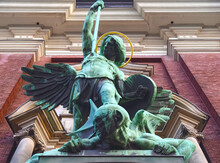 Sculpture Of Archangel Michael Fighting Satan At St. Michaelis Church In Hamburg