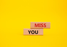 Miss You. Concept Word Miss You On Wooden Cubes. Beautiful Yellow Background. Business And Miss You Concept. Copy Space.