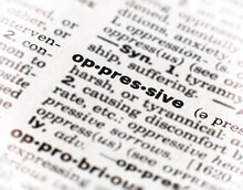 Closeup Of The Word Oppressive