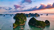 Drone Shot Of A Sunset Over Ha Long Bay In Vietnam During Sunset With Islands And Sea/ocean View From Above As Birdview Perspective