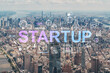 Aerial panoramic helicopter city view of Upper Manhattan, Midtown and Downtown, New York, USA. Startup company, launch project to seek and develop scalable business model, hologram