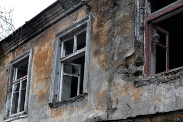 Wall Mural - Old destroyed houses. War, destruction, restructuring. abandoned, useless houses. Restitution, bombing, consequences of social and military conflicts. Legacy of the collapse of the USSR