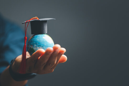 graduation cap with earth globe. concept of global business study, abroad educational, back to schoo