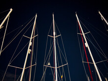 Masts Of Ship At Night