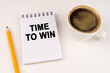 © Dzmitry - On a white surface, a cup of coffee, a pencil and a notepad with the inscription - Time to win