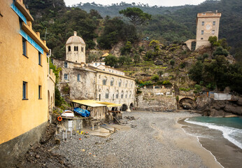 Wall Mural - San Fruttuoso Abbey and its bay, wintertime. Catholic place of worship located inside the park of Portofino (Liguria, Northern Italy); it can be accessed only by sea or by footpaths.