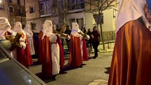 Soria, Spain - April 11, 2022: Video Of Holy Week Procession Of Hooded People Down The Street Carrying The Christ On Holy Monday