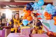 © andrey - man and woman actors play at a children's party.