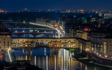 Wall Mural - Night view of Ponte Vecchio over Arno River in Florence, Italy. Architecture and landmark of Florence. Cityscape of Florence