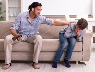 Wall Mural - Father beating and punishing his sone